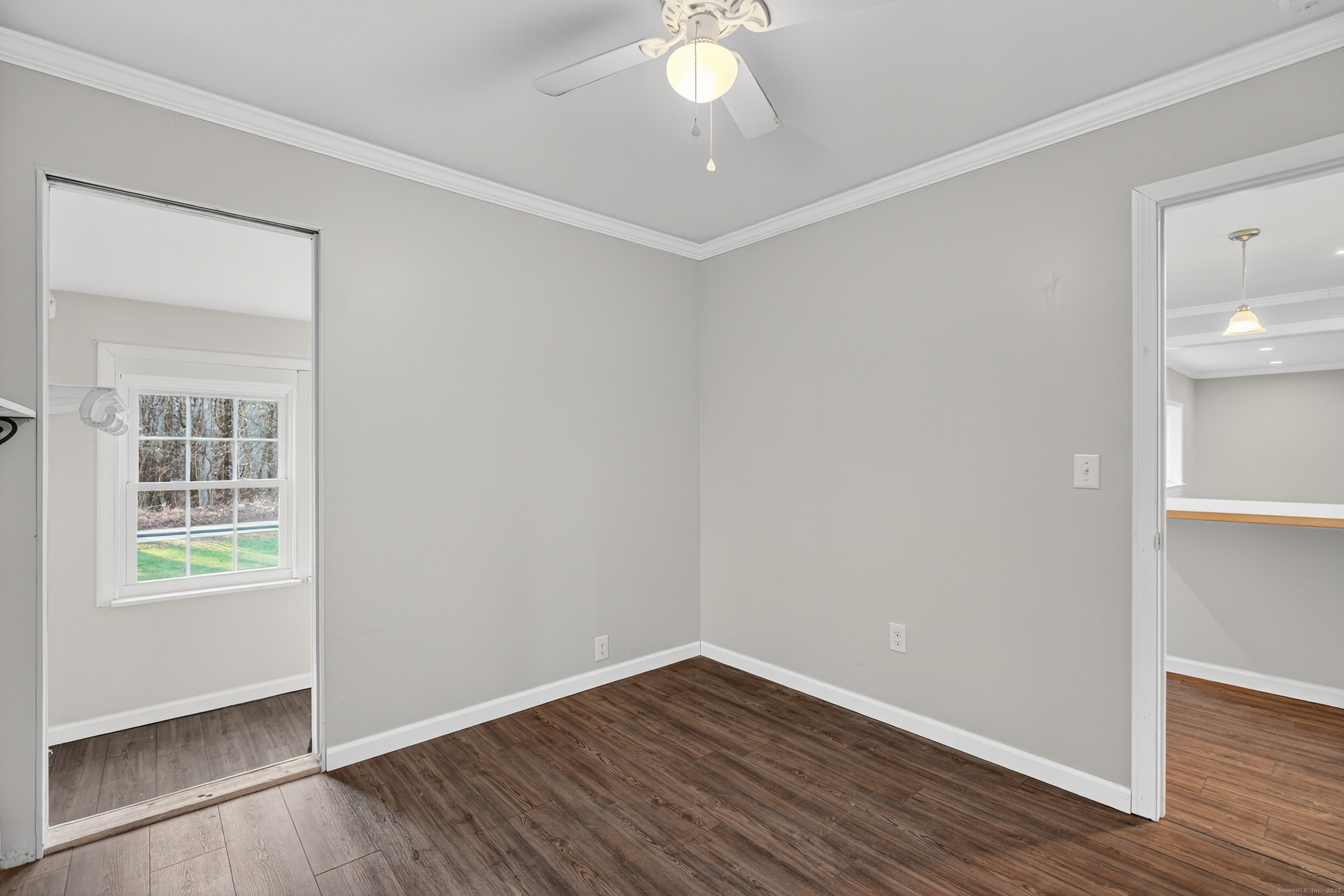 586 Back Road Windham, CT 06256 - Photo 15 of 32 wooden floor in an empty room with a window