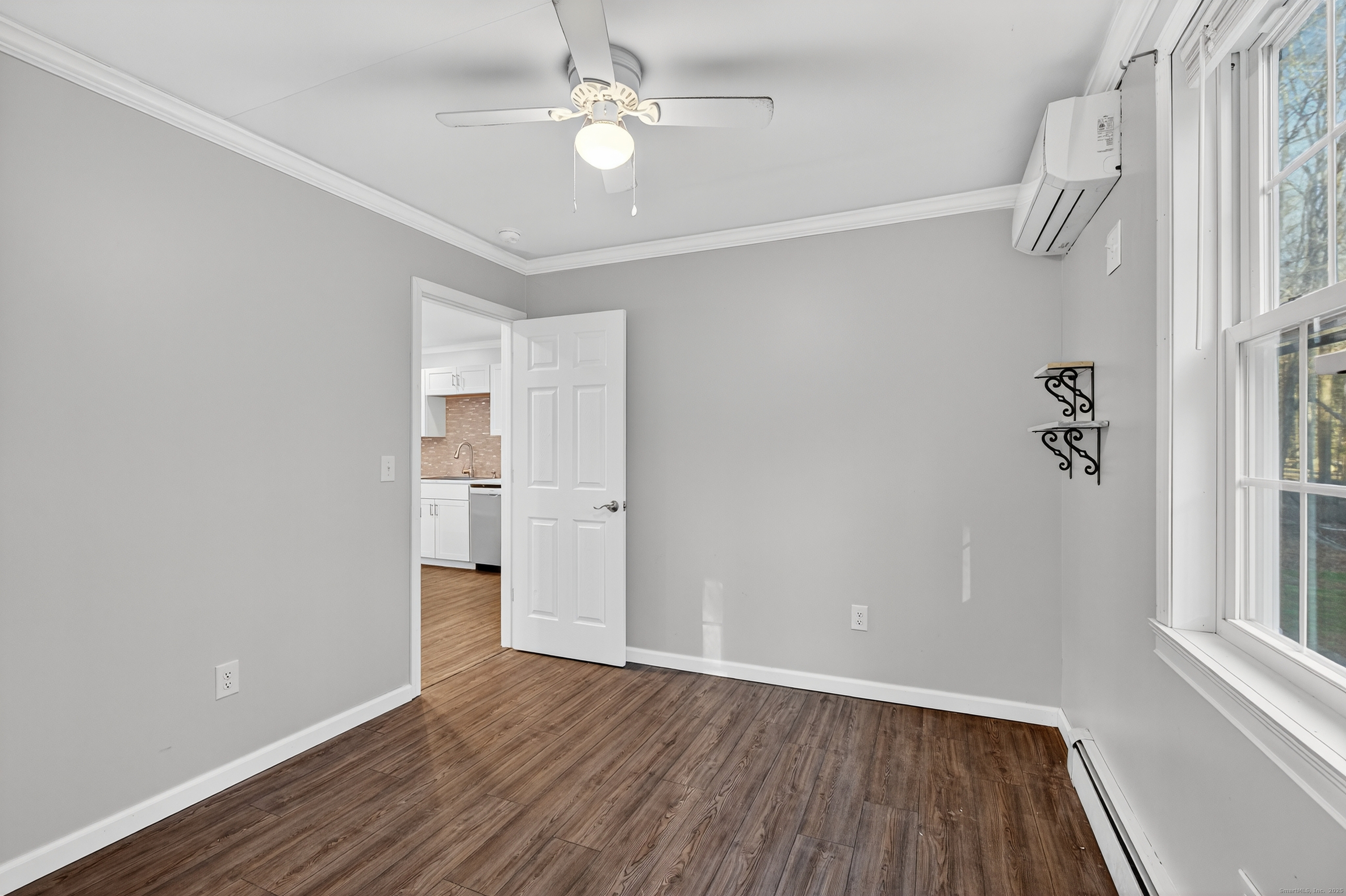 586 Back Road Windham, CT 06256 - Photo 16 of 32 wooden floor in an empty room with a window