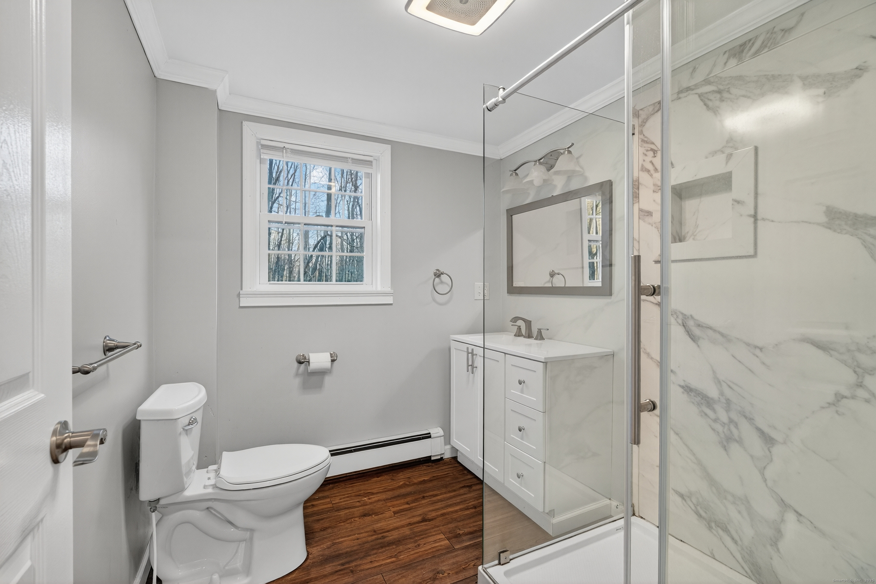 586 Back Road Windham, CT 06256 - Photo 17 of 32 a bathroom with a sink toilet and shower