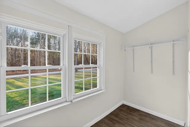 a view of outdoor space with playground and green space