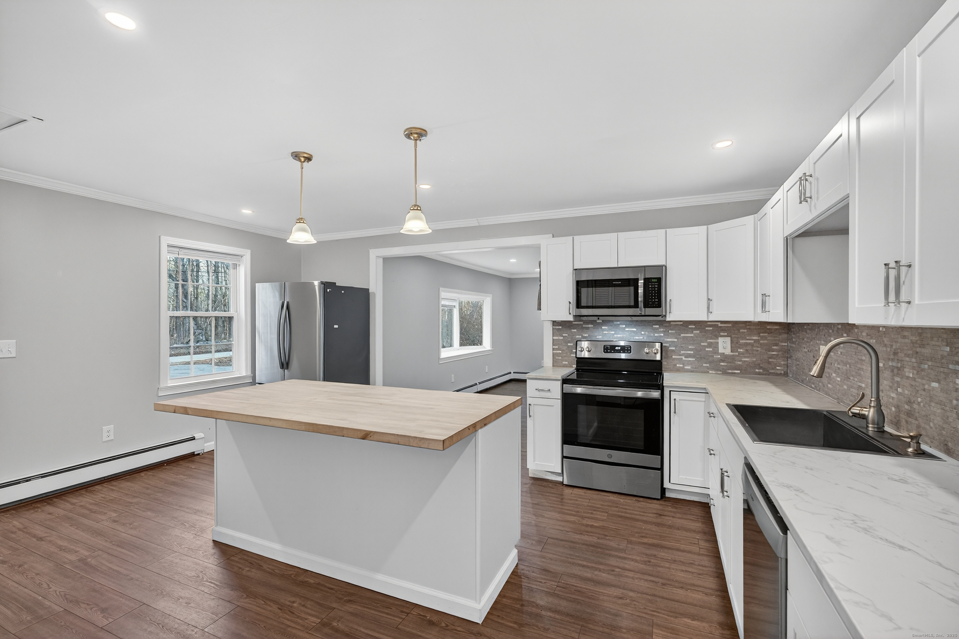 586 Back Road Windham, CT 06256 - Photo 8 of 32 a large kitchen with stainless steel appliances granite countertop a stove and a sink