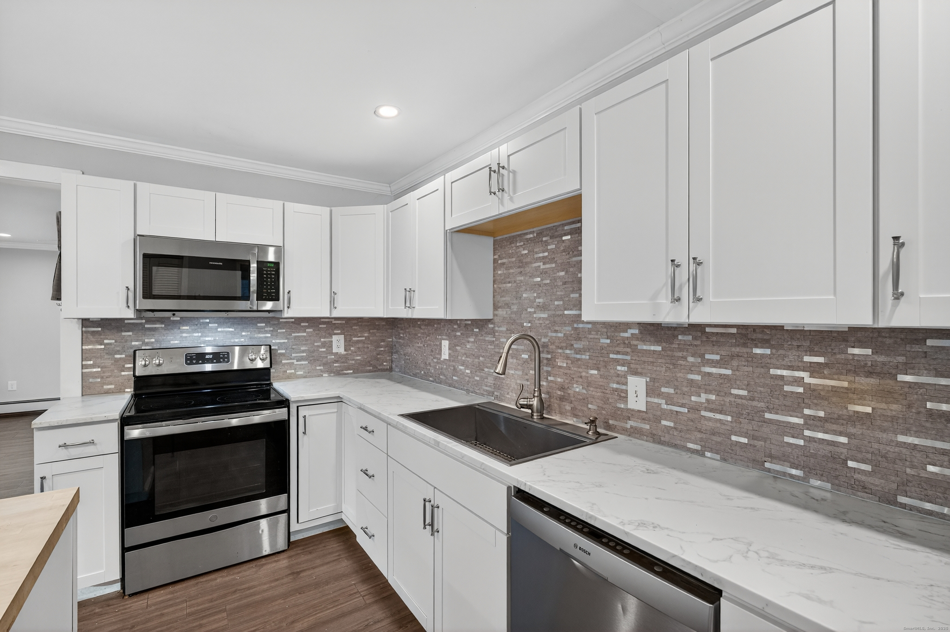 586 Back Road Windham, CT 06256 - Photo 9 of 32 a kitchen with a sink stove and microwave