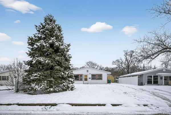 a view of a house with a snow