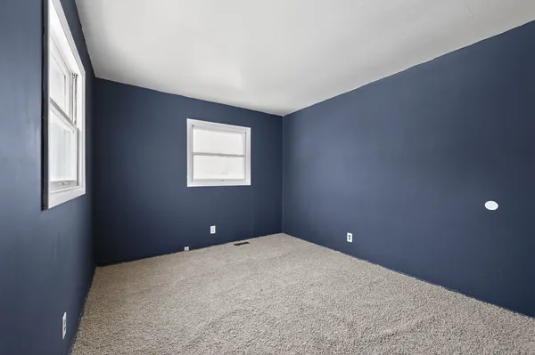 a view of a window in an empty room