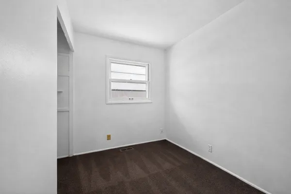 an empty room with a window