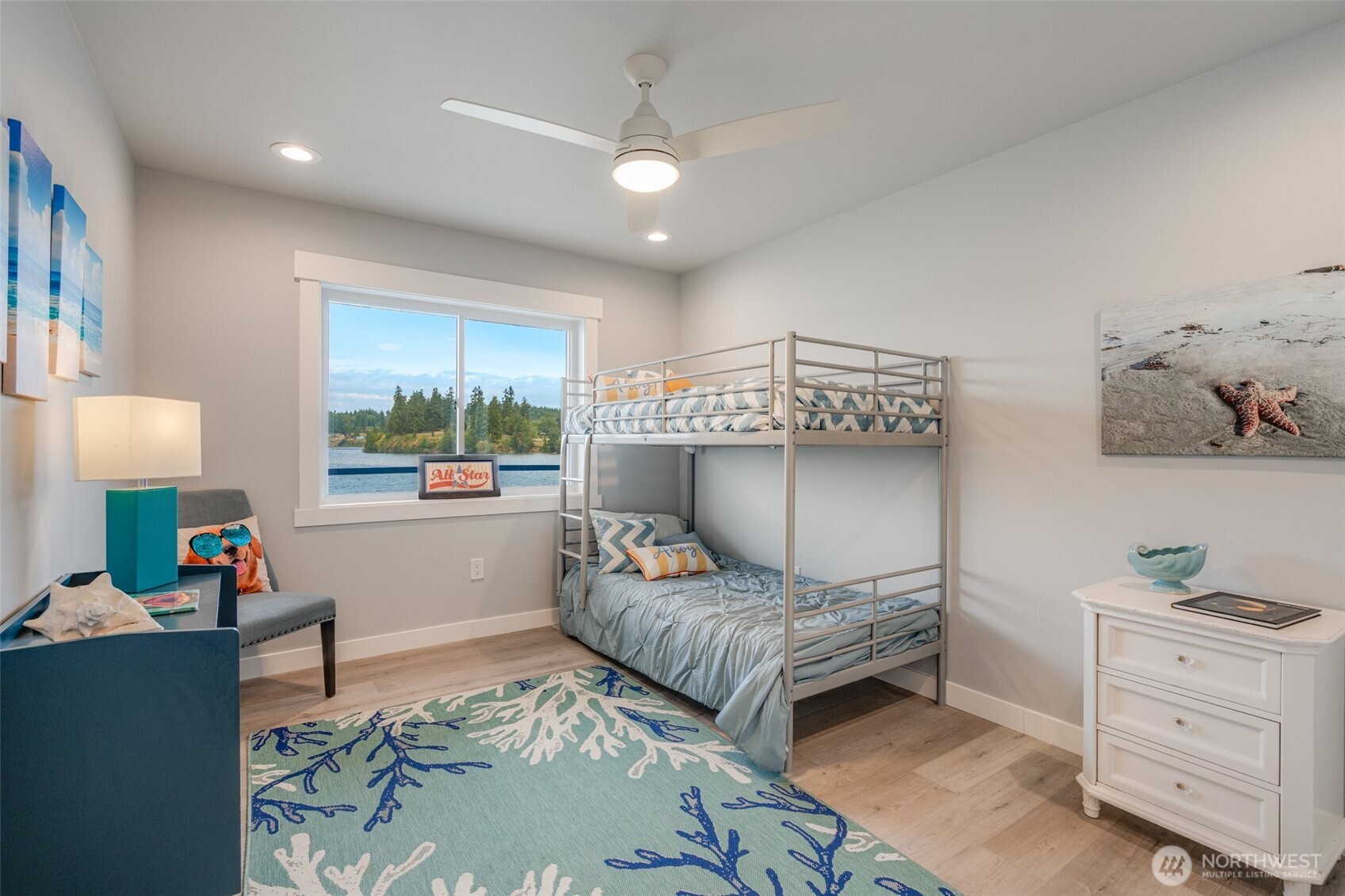5341 South Bercot Road Freeland, WA 98249 - Photo 25 of 37 a bedroom with furniture and a wooden floor