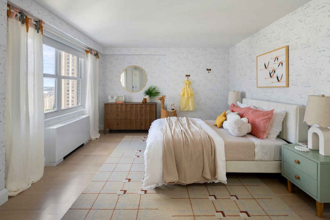 155 West 68th Street, Unit 30A Manhattan, NY 10023 - Photo 7 of 18 a spacious bedroom with a bed and a window