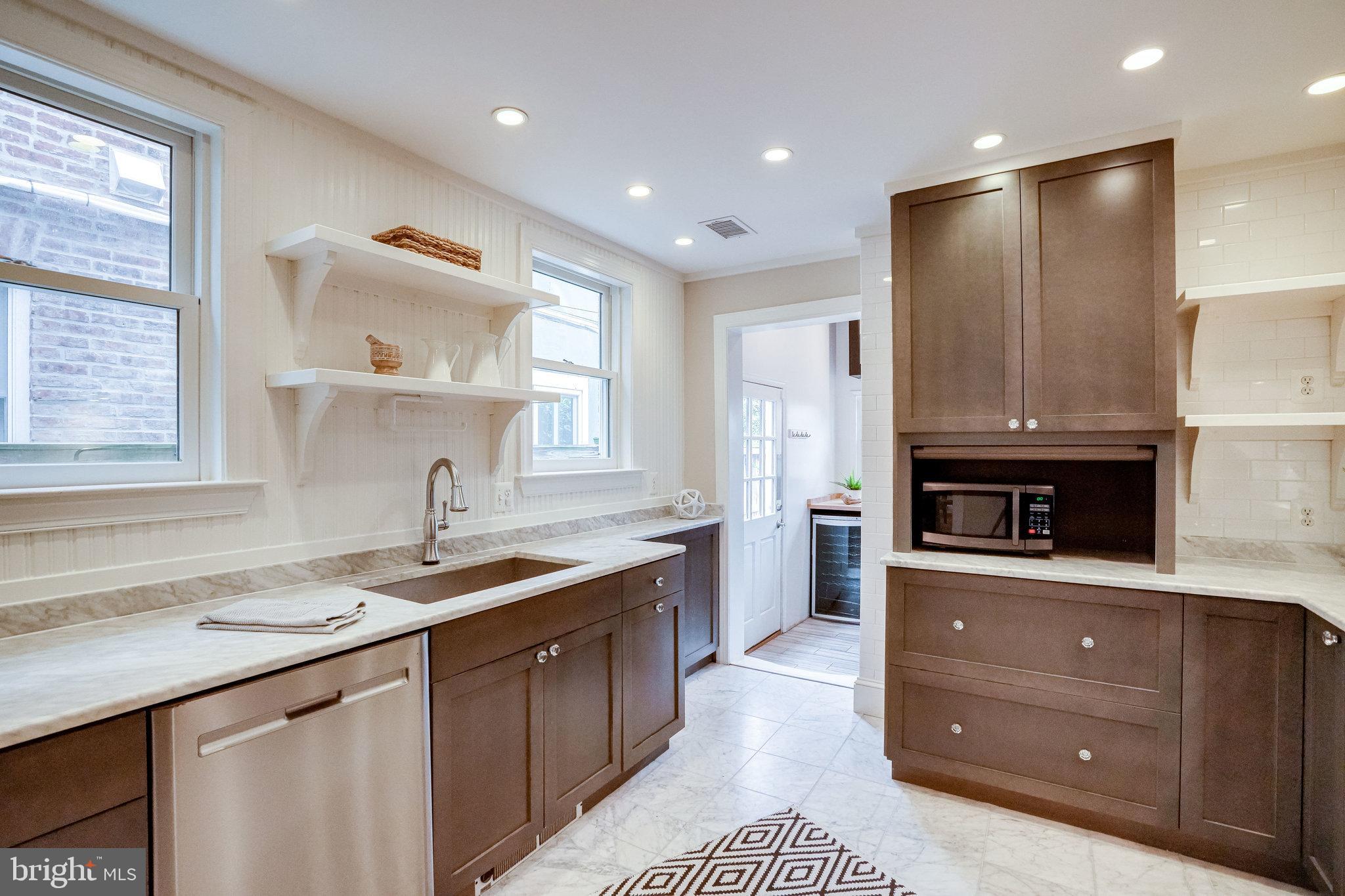611 G Street Southeast Washington, DC 20003 - Photo 13 of 30 Kitchen leading to mudroom and laundry