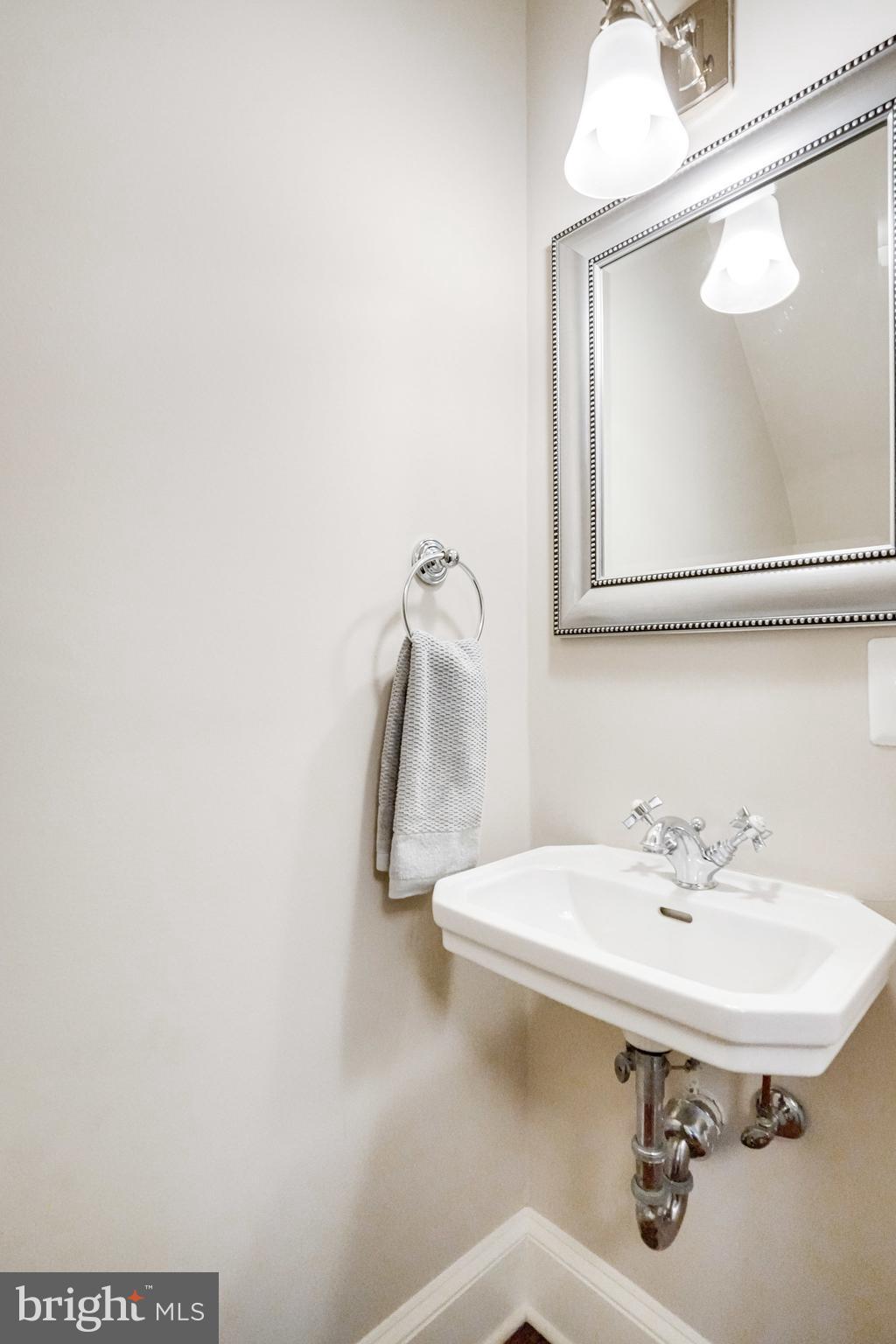 611 G Street Southeast Washington, DC 20003 - Photo 17 of 30 Updated hall bathroom on main level