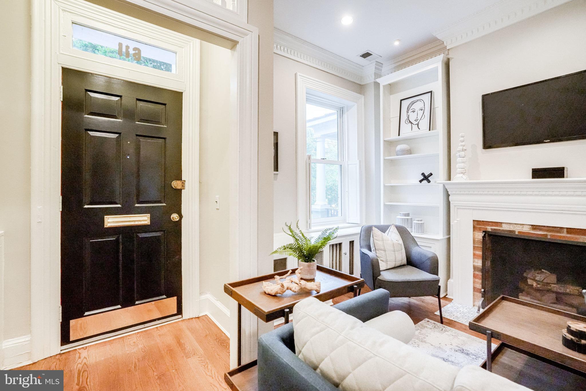 611 G Street Southeast Washington, DC 20003 - Photo 2 of 30 Entryway and living area with built-ins