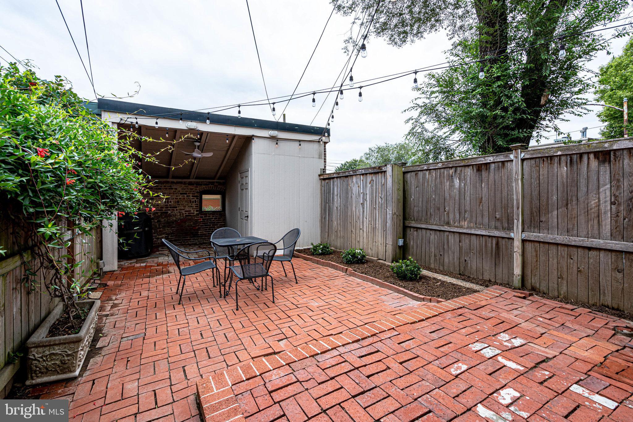 611 G Street Southeast Washington, DC 20003 - Photo 28 of 30 Private outdoor patio with storage shed