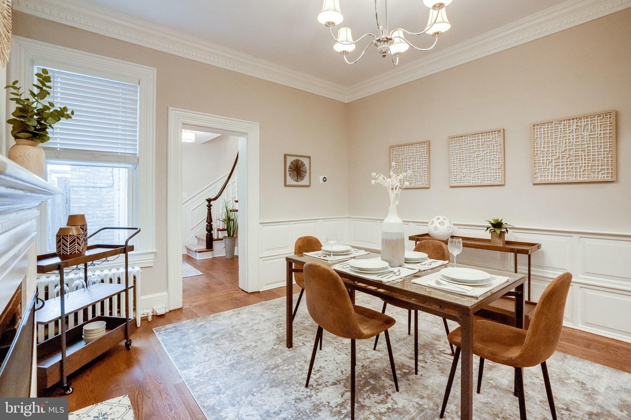 611 G Street Southeast Washington, DC 20003 - Photo 8 of 30 Dining area with hardwood floors and crown molding
