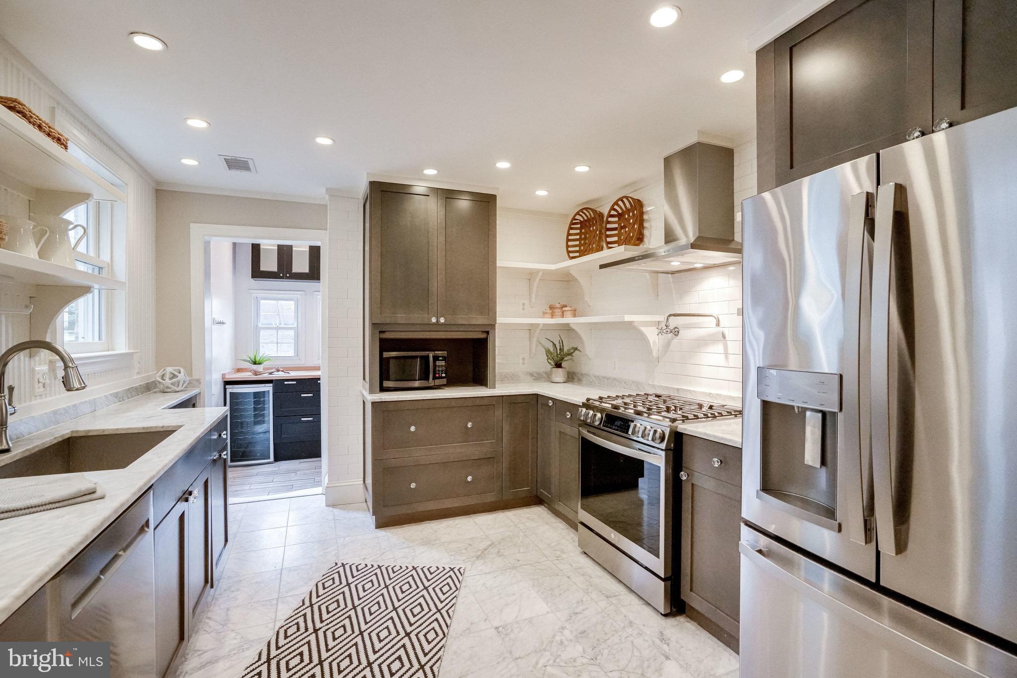 611 G Street Southeast Washington, DC 20003 - Photo 10 of 30 Stainless steel appliances and marble tile floor