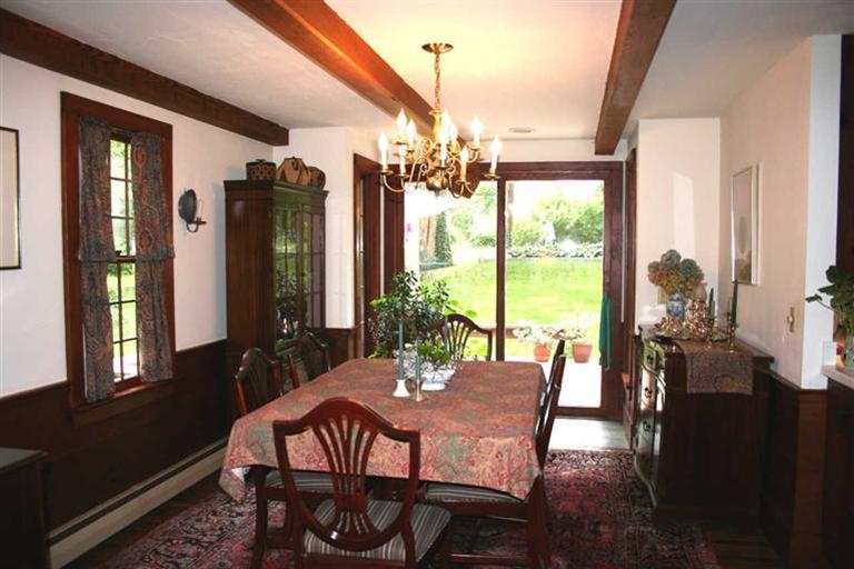 11 Sparrowhawk Road Orleans, MA 02653 - Photo 8 of 16 a view of a dining room with furniture window and outside view