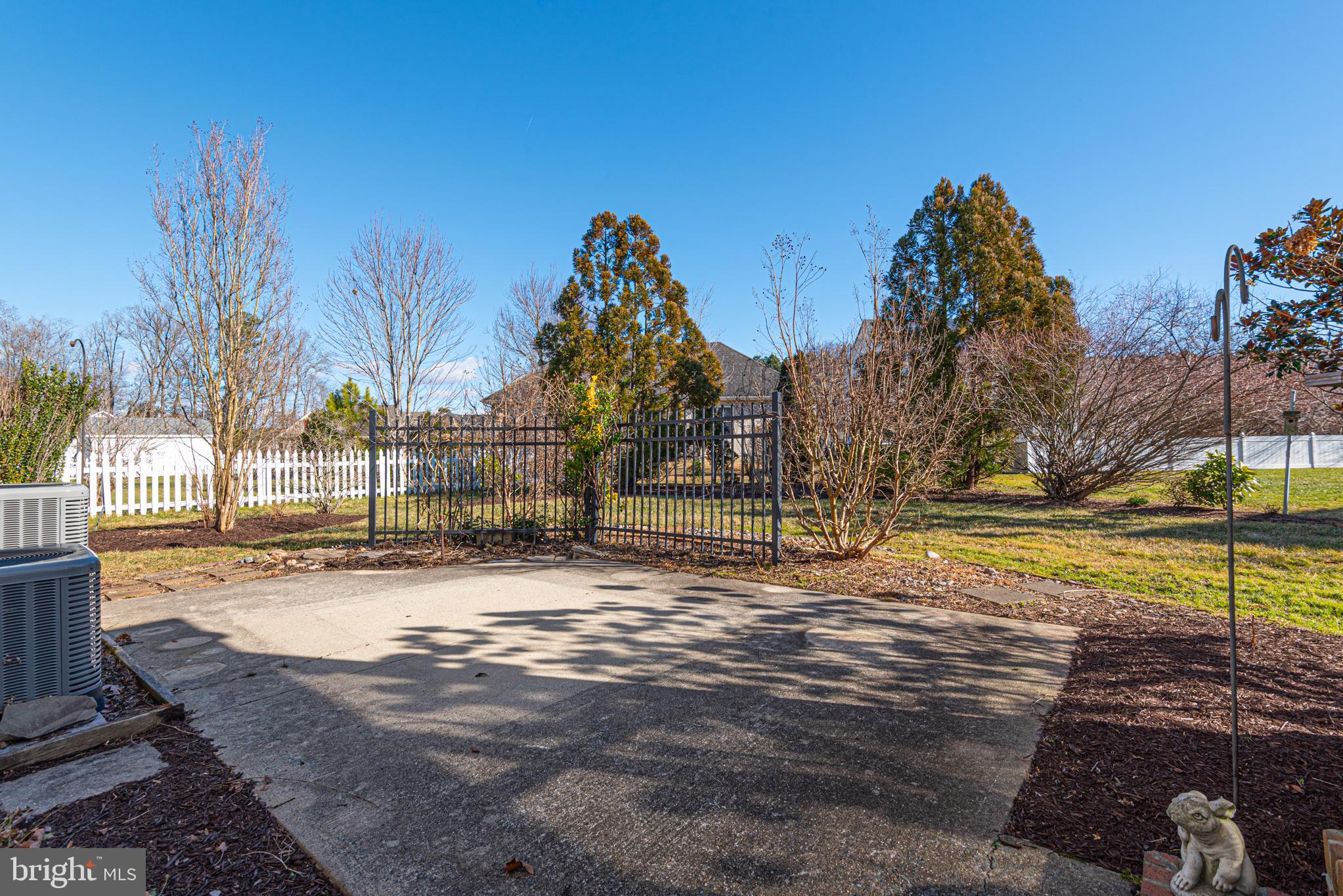 6023 Tarry Town Road Salisbury, MD 21801 - Photo 58 of 61 Serene backyard oasis with lush greenery.