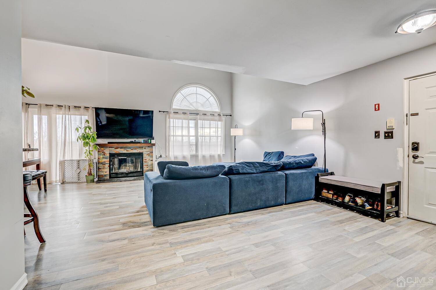 1233 Edpas Road New Brunswick, NJ 08901 - Photo 6 of 26 a living room with furniture and a flat screen tv