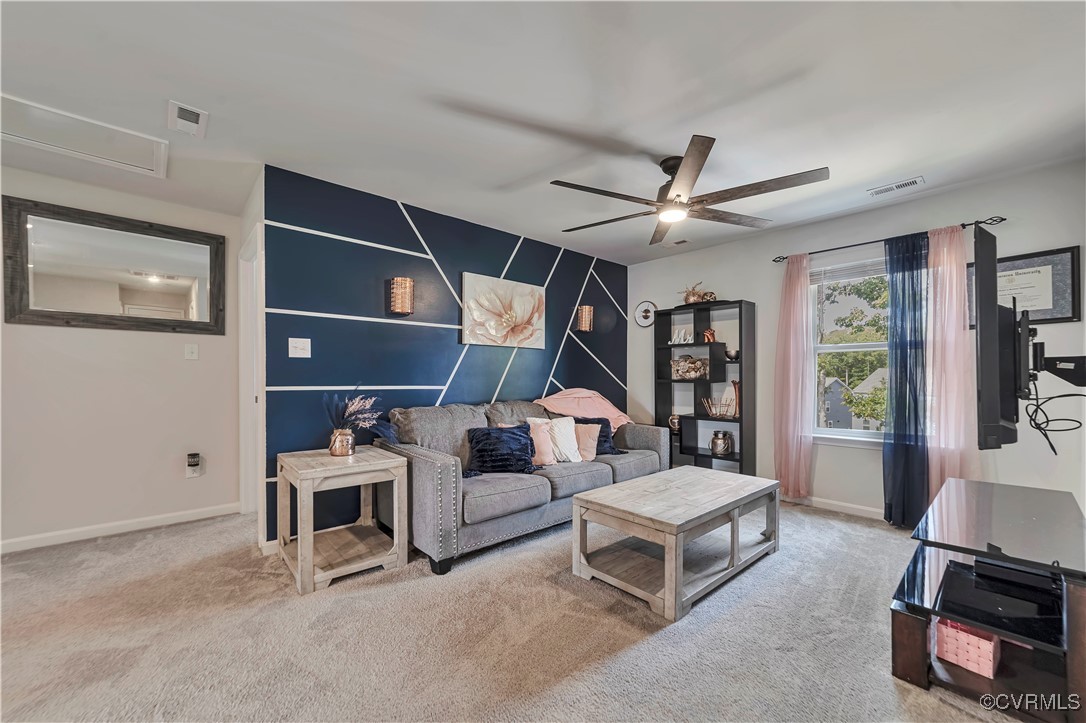 7232 Cress Terrace New Kent, VA 23124 - Photo 21 of 42 a living room with furniture and a ceiling fan