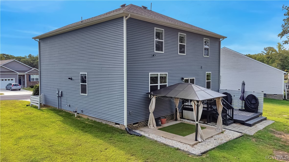7232 Cress Terrace New Kent, VA 23124 - Photo 34 of 42 a view of a house with a backyard