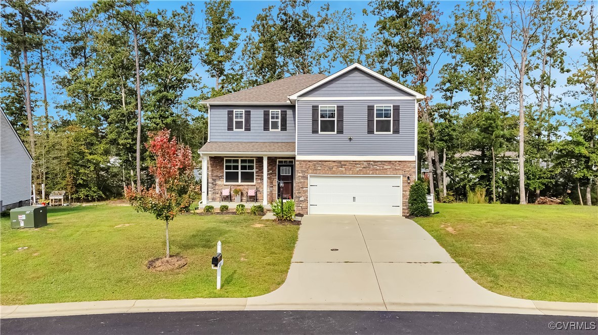 7232 Cress Terrace New Kent, VA 23124 - Photo 42 of 42 a view of a house with a swimming pool