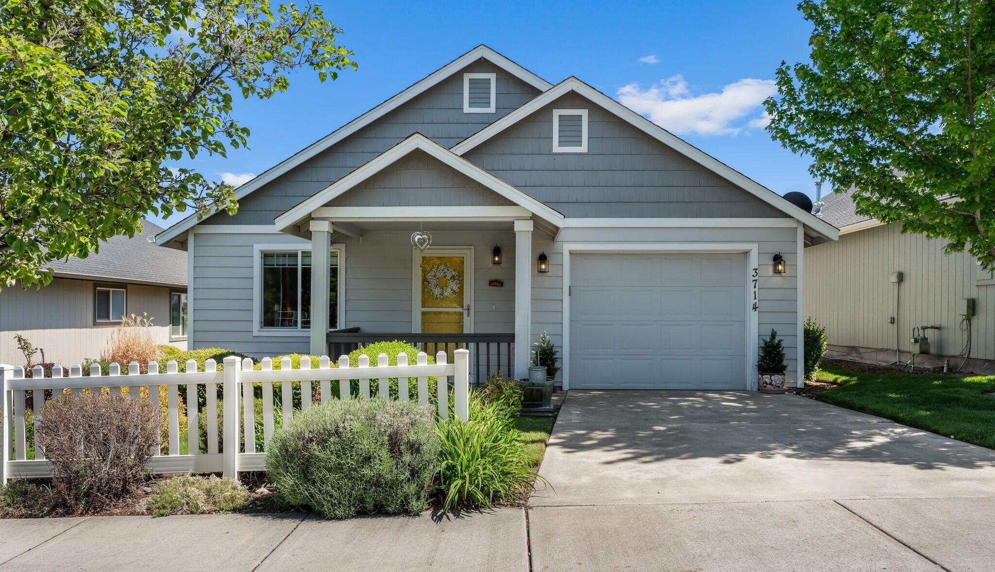 3714 Southwest 29th Street Redmond, OR 97756 - Photo 1 of 21 a front view of a house with a yard