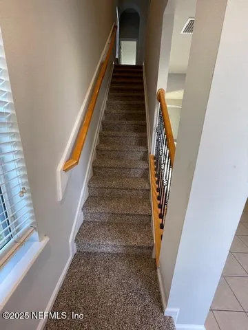 an empty room with a bench