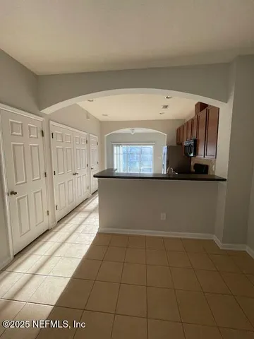 a view of street with parked cars