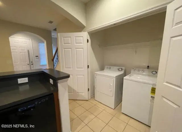 a view of a back yard from a balcony