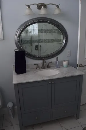 a view of a bedroom with a bed