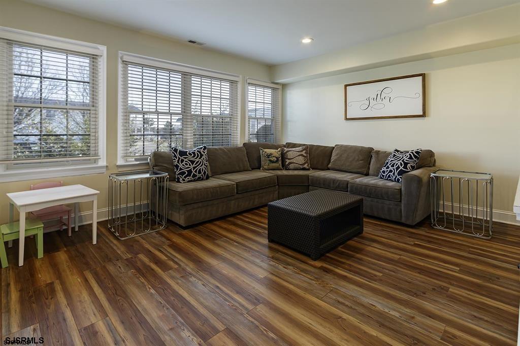 205 West Brigantine Avenue Brigantine, NJ 08203 - Photo 19 of 31 a living room with furniture and a large window