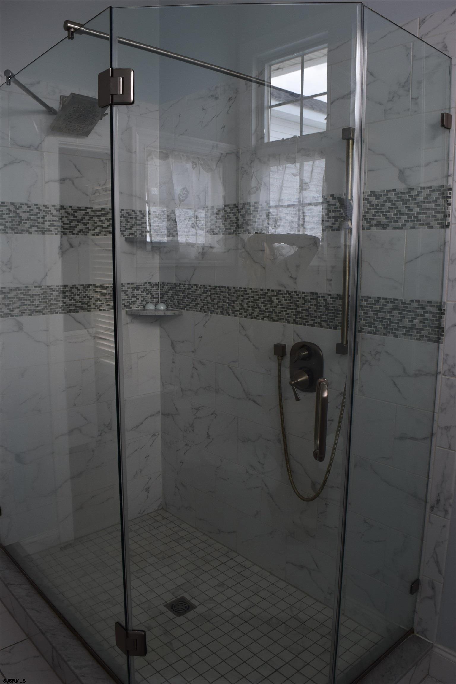 205 West Brigantine Avenue Brigantine, NJ 08203 - Photo 22 of 31 a bathroom with a shower