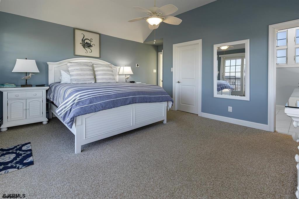 205 West Brigantine Avenue Brigantine, NJ 08203 - Photo 7 of 31 a bedroom with a bed wall painting and window