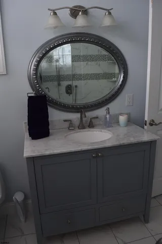 a view of a bedroom with a bed