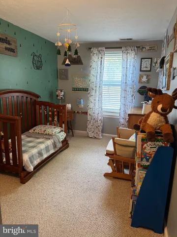 a room with furniture and natural light