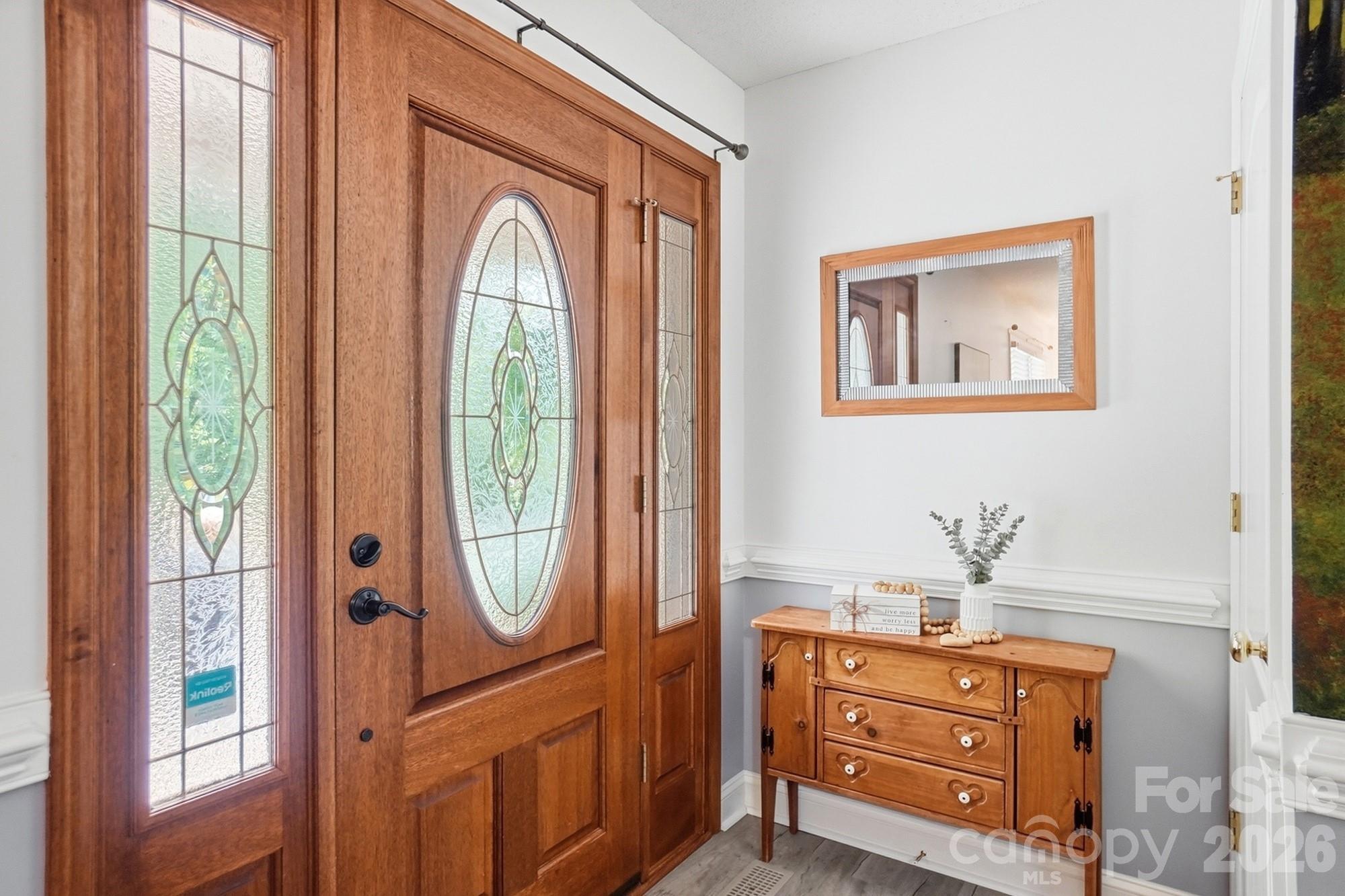 4017 Mullis Newsome Road Monroe, NC 28110 - Photo 11 of 38 a view of front door with hallway