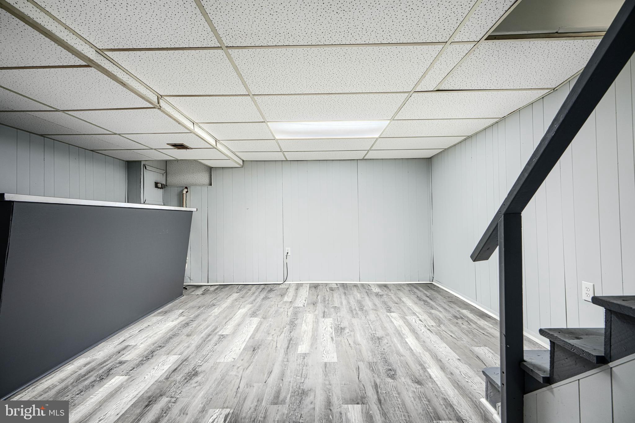 2123 Graythorn Road Middle River, MD 21220 - Photo 20 of 29 a view of a room with wooden floor and white walls
