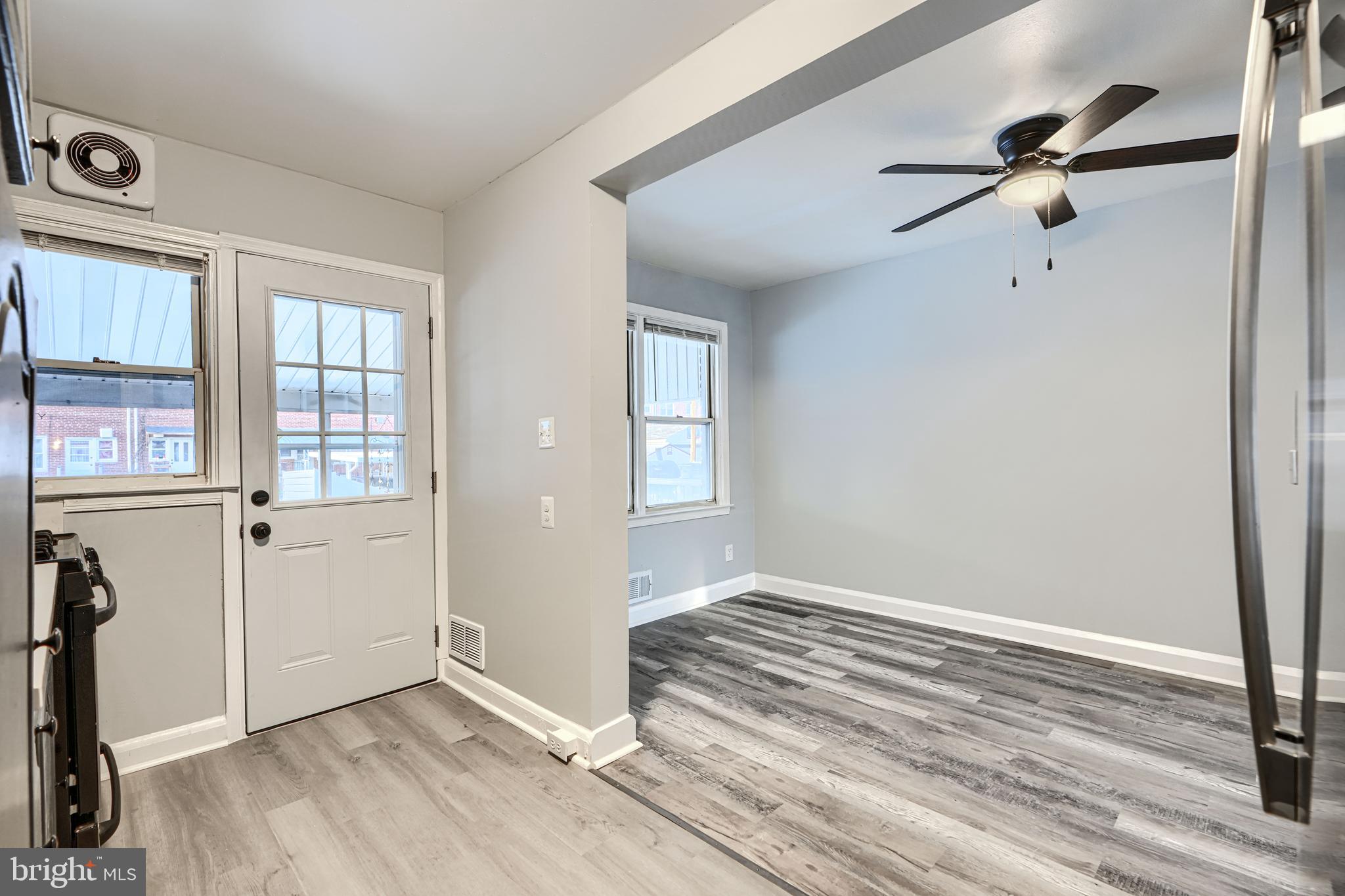 2123 Graythorn Road Middle River, MD 21220 - Photo 8 of 29 an empty room with wooden floor closet and windows