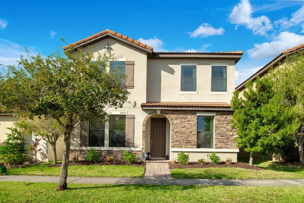2039 Resurrection Fern Way Ocoee, FL 34761 - Photo 1 of 1 front view of a house with a yard
