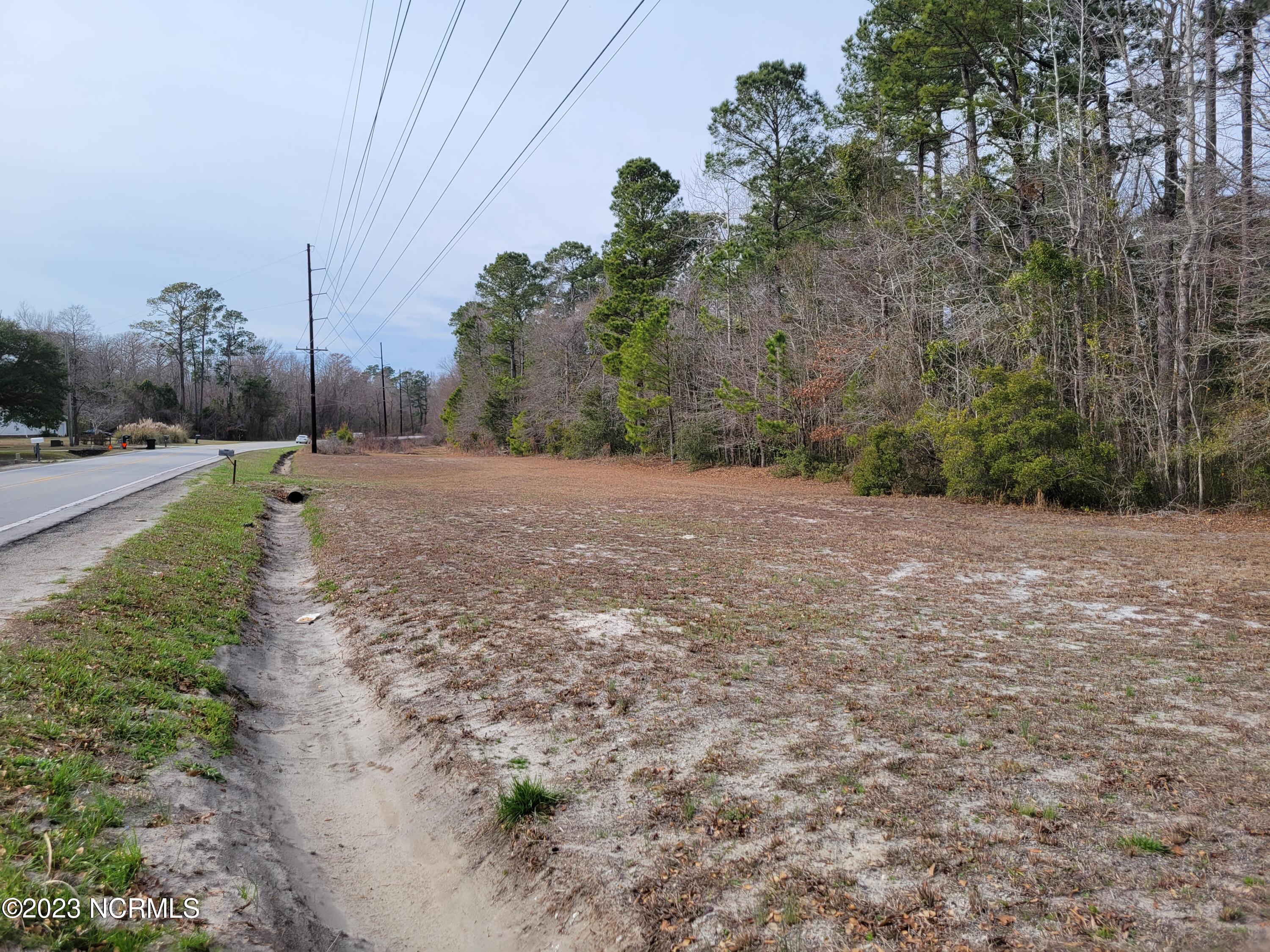 205 Sand Ridge Road Hubert, NC 28539 - Photo 3 of 27 Over 600 ft of road frontage on Sandridge rd