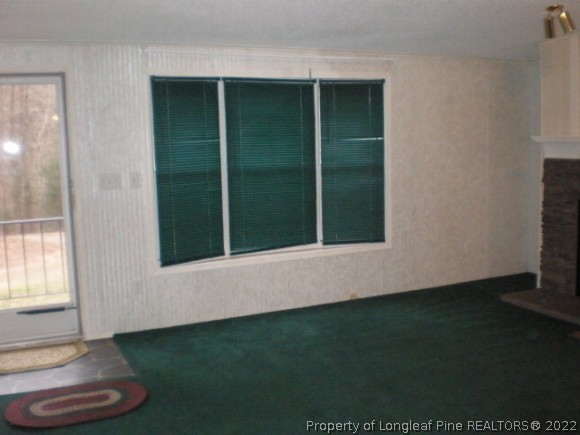 848 Torchwood Road Carthage, NC 28327 - Photo 13 of 14 a view of an empty room with a window