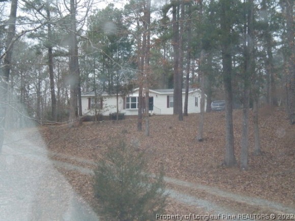 848 Torchwood Road Carthage, NC 28327 - Photo 3 of 14 a view of a house with a yard