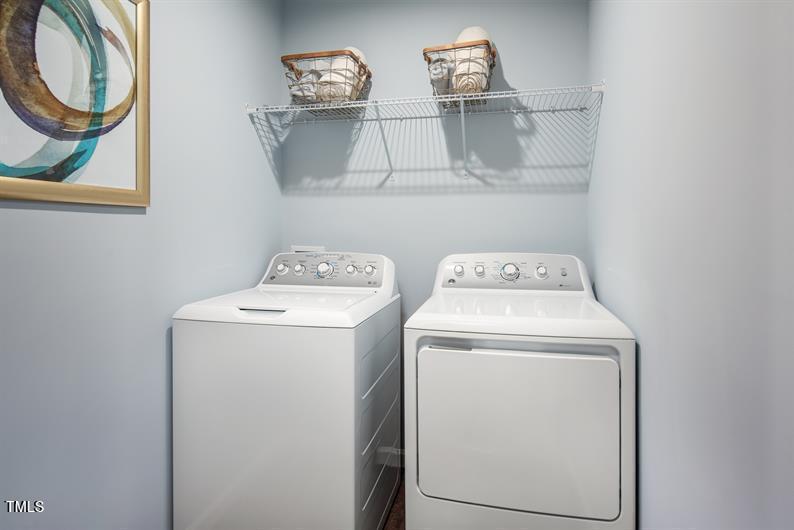 237 Suburban Meadow Pass Wendell, NC 27591 - Photo 15 of 15 a utility room with dryer and washer