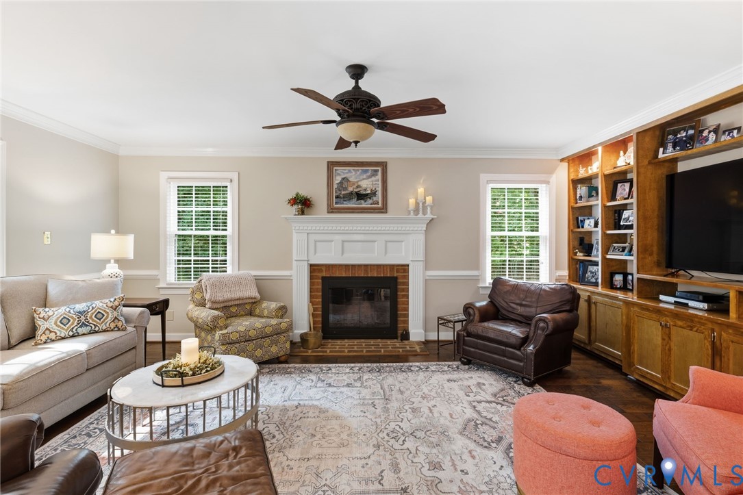 14019 Princess Mary Road Chesterfield, VA 23838 - Photo 14 of 61 Brick fireplace with a detailed mantel, built-in m