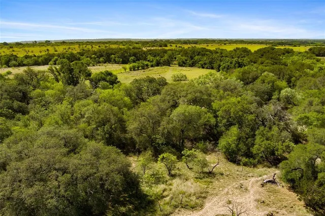 a view of a yard with an outdoor space