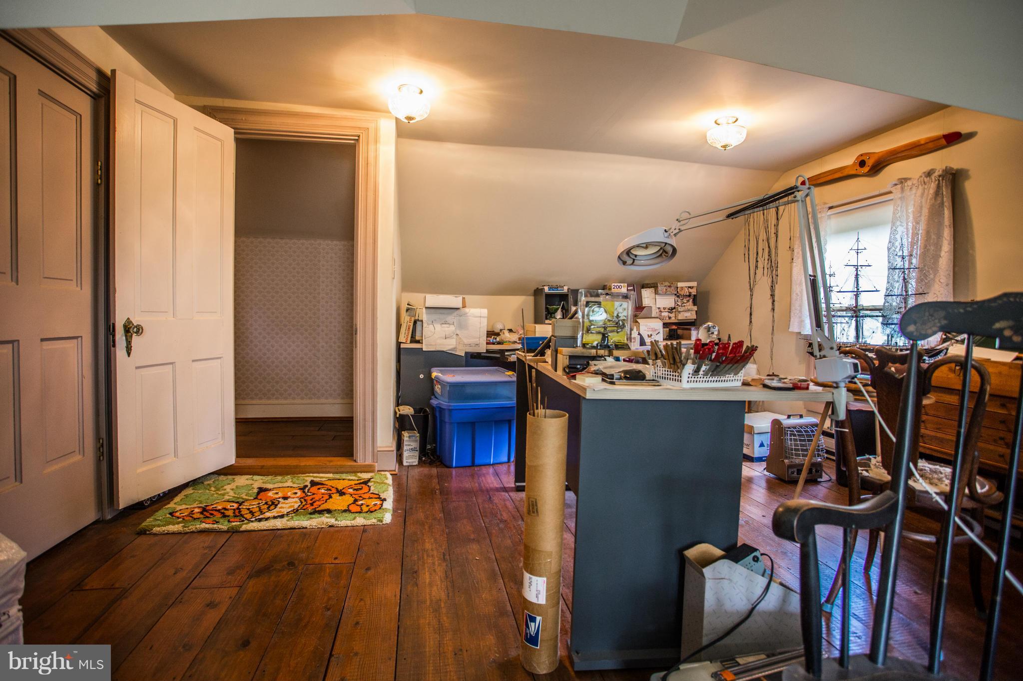3965 Chaneyville Road Owings, MD 20736 - Photo 22 of 30 a bed room with a bed and a television