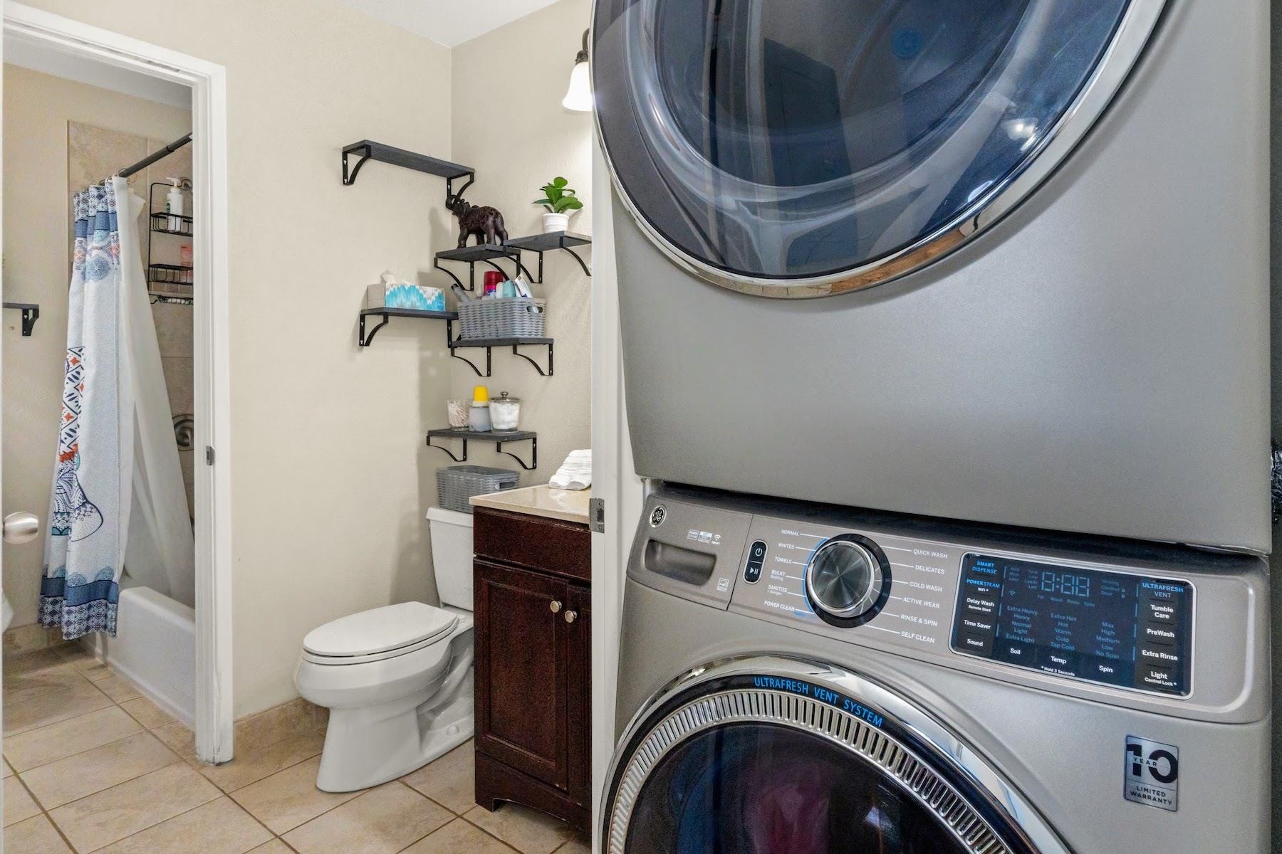 480 Kenolio Road, Unit 12201 Kihei, HI 96753 - Photo 11 of 25 a bathroom with a toilet and a sink