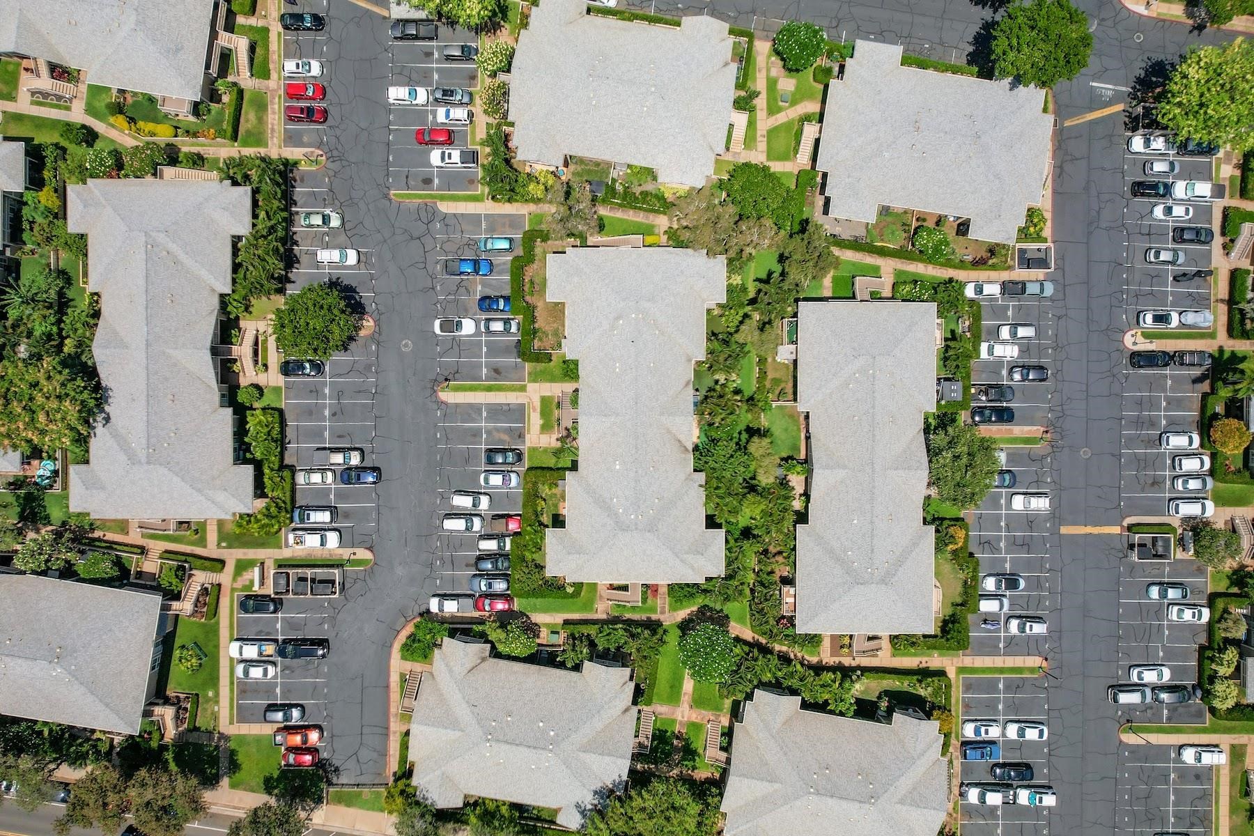 480 Kenolio Road, Unit 12201 Kihei, HI 96753 - Photo 23 of 25 an aerial view of residential houses with outdoor space and street view