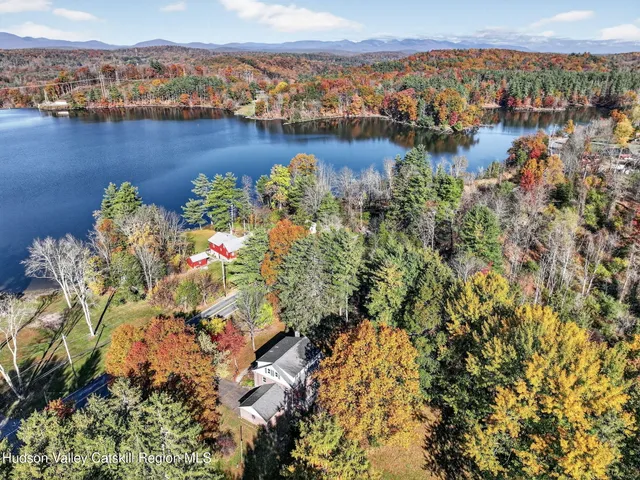 a house with trees in front of it