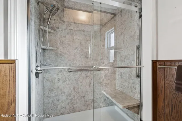 a utility room with a stove a washer and dryer