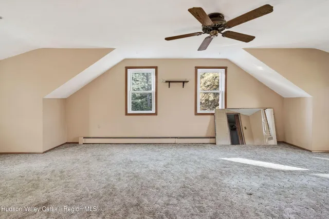a bathroom with a mirror and a sink