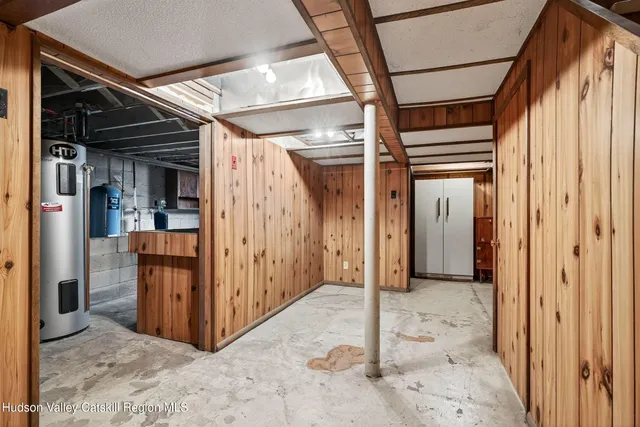 a view of a lake with houses in the back